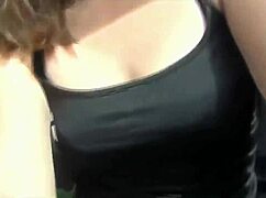 Young adult has fun in the car with toys