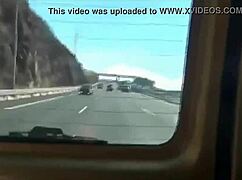 Young adult has fun in the car with toys