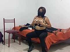 The naughty nurse boldly gropes her big juicy tits while treating the patient