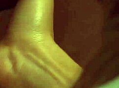 redhead woman in restraint with gag receiving discipline