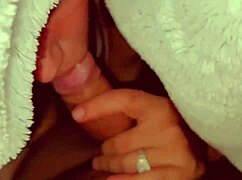 A couple flashes at a party and she sucks cock