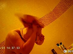 Spy Camera Captures Nude Tits In Shower