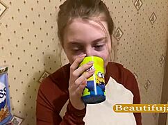In the kitchen, a cute blonde teen gives a homemade blowjob leading to orgasm