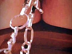 Big pink pussy lips dangled and stretched with weights