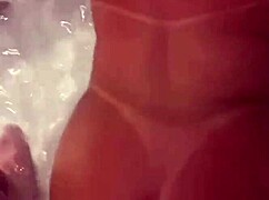 A milf sucks her husband's young employee with big natural tits.