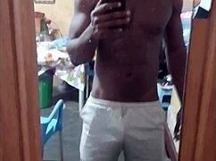 hey good morning stud wanna watch this muscular babe flash her big black cock body?